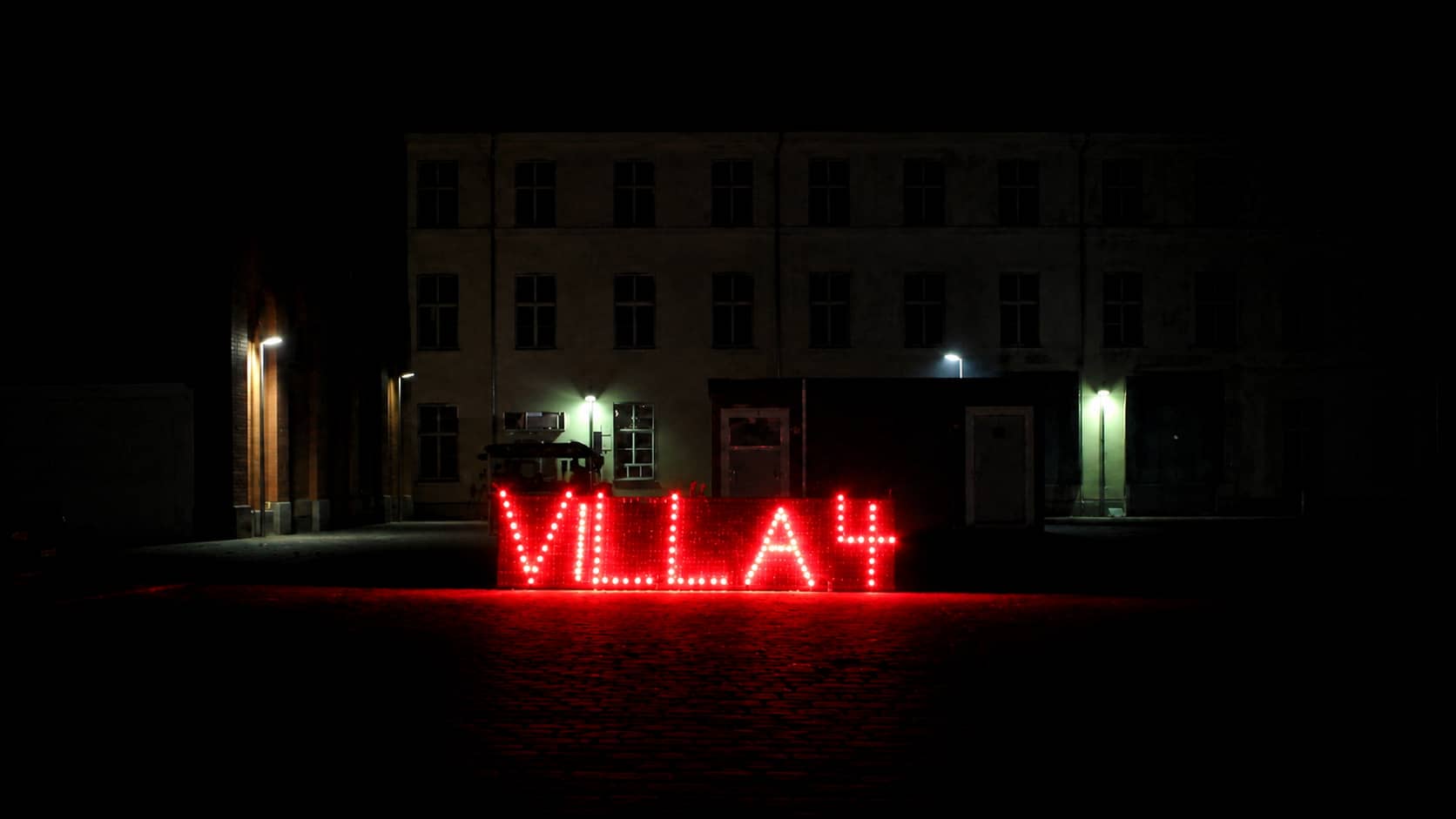 Leuchtender Schriftzug als individuelles Lichterbild bei einem Firmenevent